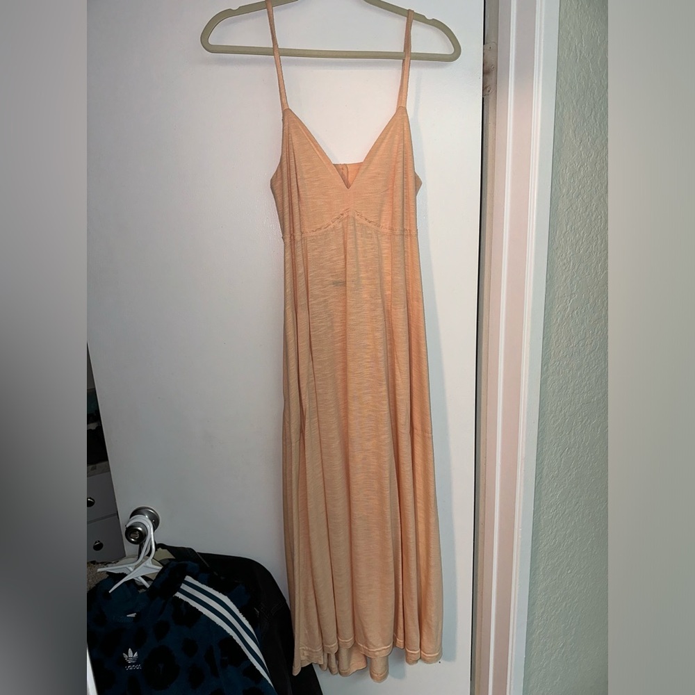 Peach color dress with pockets